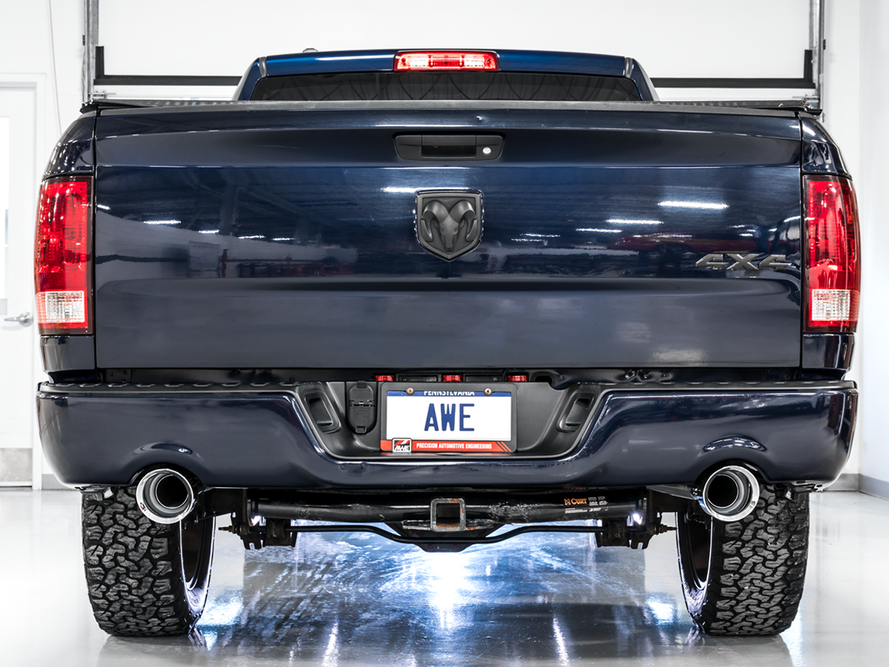 AWE 0FG Dual Rear Exit Catback Exhaust for 4th Gen RAM 1500 5.7L (with bumper cutouts) - Chrome Silver Tips (3015-32002)
