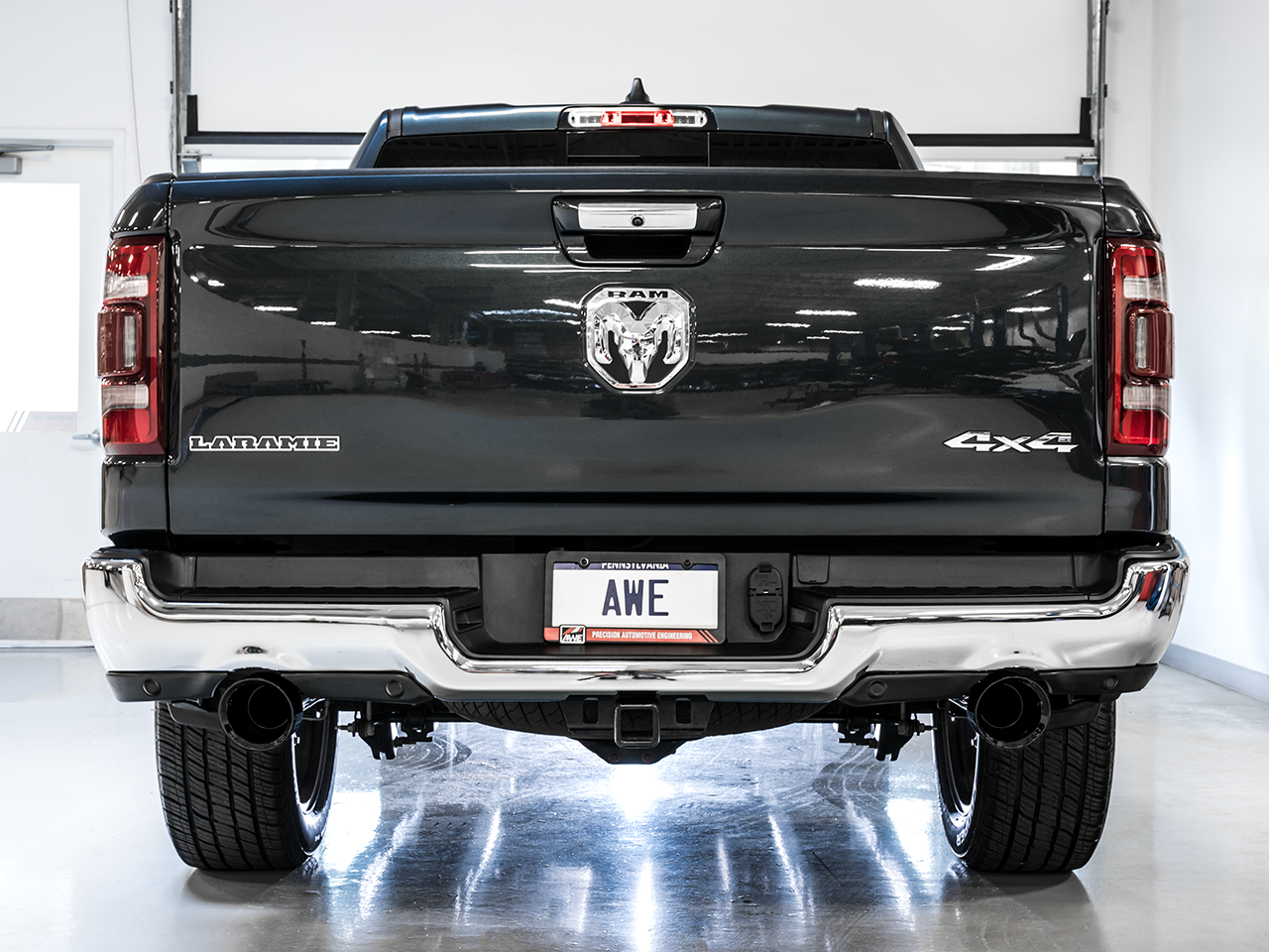 AWE 0FG Dual Rear Exit Catback Exhaust for 5th Gen RAM 1500 5.7L (with bumper cutouts) - Diamond Black Tips (3015-33006)